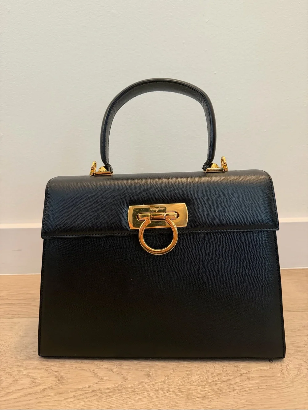 Vintage Salvatore Ferragamo Black Top-Handle Bag with Gold Gancini Closure